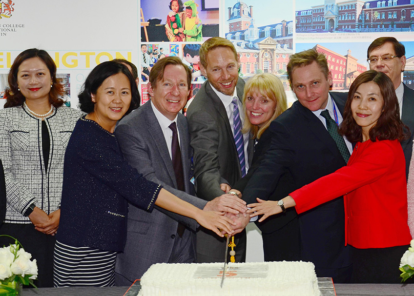 Representatives of Wellington College cut a cake together to celebrate the fifth anniversary of Wellington College International Tianjin