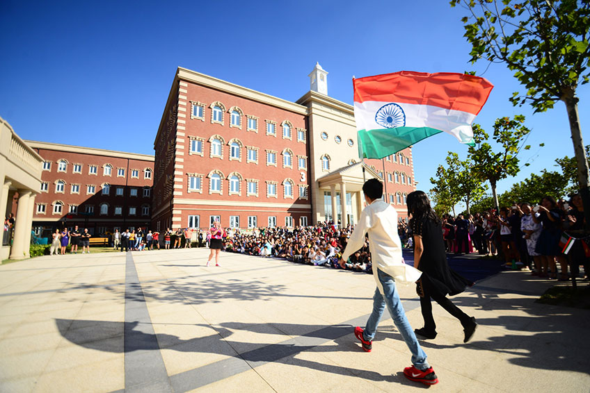 Raising all twenty flags at Wellington College