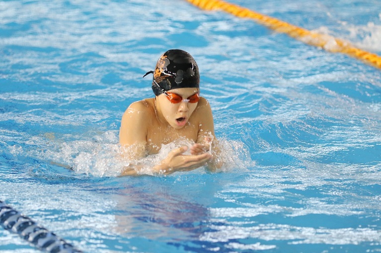 Wellington swimmers in action at Mantas meet in Hong Kong