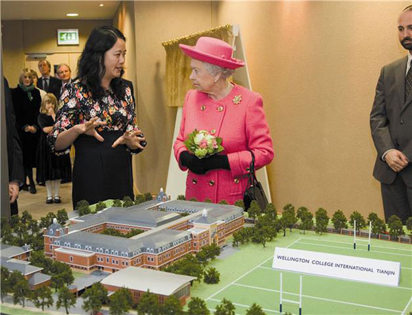 Her Majesty the Queen introduced to Wellington College International Tianjin and inspects school model